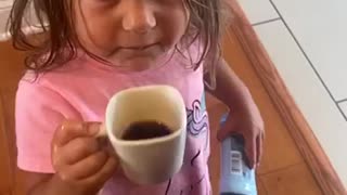 Kid tastes mom's coffee, immediately spits it out