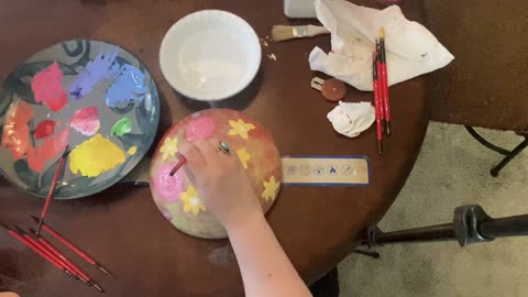 Painting flowers on sourdough