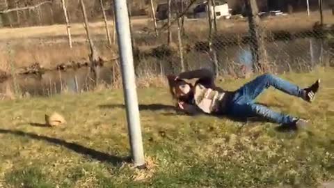 Backwards hat jumps into street sign