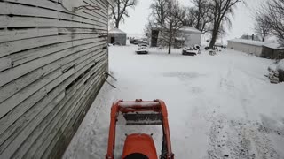 Kubota Bx25 Plowing snow with loader and Box blade, driveway and mailbox