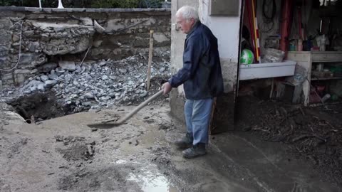 Clean-up begins after mudslide hits Italian village