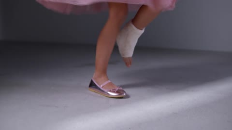 Girl With Broken Foot Dancing in Fairy Costume