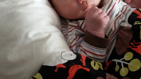 Infant has adorable reaction to mom's voice