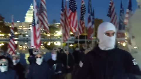 "Patriot Front" marching on the national mall in Washington, DC, chanting "reclaim America"