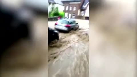 Torrent of floodwater washes away cars in Belgium