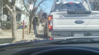 Driver Confronts Man Holding Up Traffic