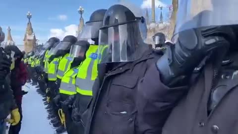 Freedom Convoy 2022 - Protesters Hug Cop - Sargent Steps In