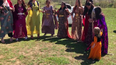 Kurds teaching Westerners how to dance