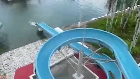 Hilarious Little Pup LOVES Giant Waterslide!