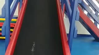 Kid has a blast going down slides