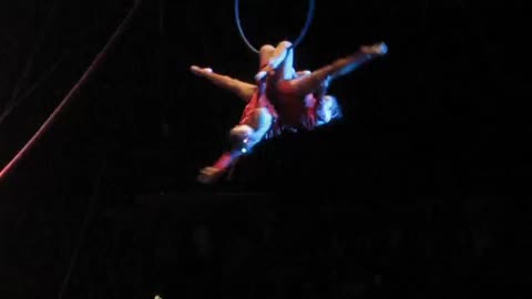 Acrobatics - two girls doing amazing movements 10 meters above ground.
