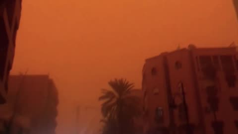 Sand Storm Turns Sky Orange