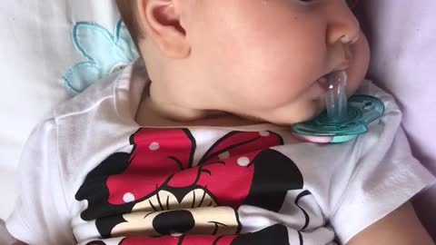 Baby Desperately Struggles To Regain Control Of Her Pacifier