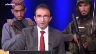 Afghan TV Show Host Surrounded By Taliban with Guns Tells Public Not To Be Afraid and Cooperate