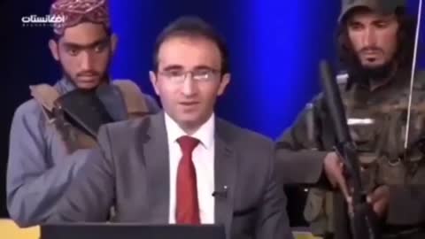 Afghan TV Show Host Surrounded By Taliban with Guns Tells Public Not To Be Afraid and Cooperate