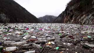 Floating waste dump in Bosnia threatens health, tourism