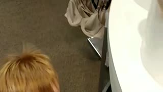 Boy Gives Dad Anatomy Lesson While Shopping