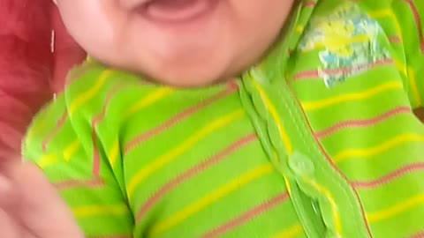 Small cute baby in funny moment