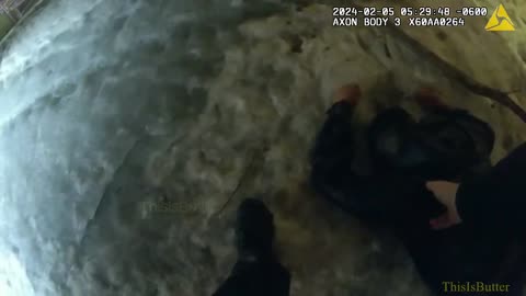 Body cam video shows dramatic river rescue of a man who fell through ice