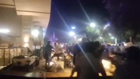 Turks destroy a Starbucks branch in the Turkish Batman district, in protest of the