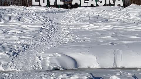 "LOVE ALASKA" Sign along with Chena River in Fairbanks, Alaska in April