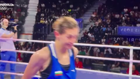 Bulgarian Boxer Svetlana Staneva holds up an (XX) chromosome symbol || London Olympics 2024