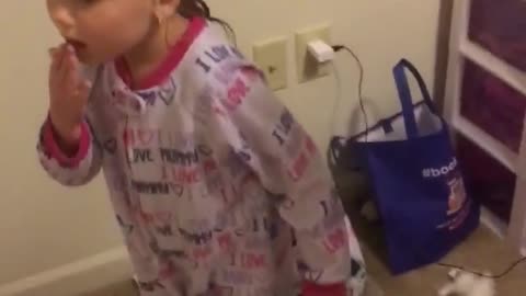 Girl Pulls Her Own Loose Tooth