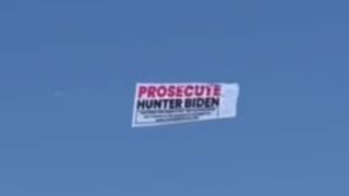 "Prosecute Hunter Biden" Sign Seen Flying Over Joe Biden's Beach Home in Rehoboth Beach, DE