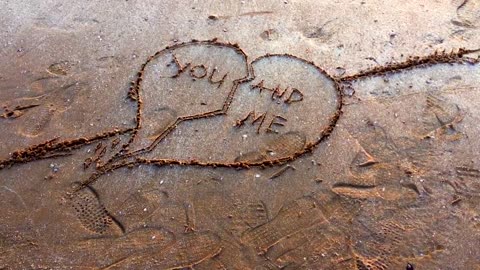 You and me Broken heart written at sand [Free Stock Video Footage Clips]