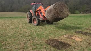 M9540 loading hay