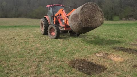 M9540 loading hay