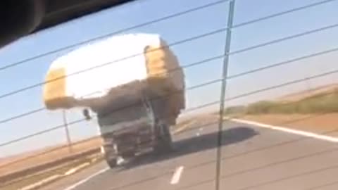 Over loaded lorry in Moroccan motorway