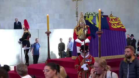 Emotional Joe Biden Views Queen Lying in State in London_4