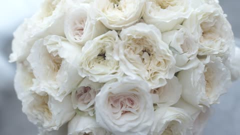 Bridal bouquet of white flowers in a close up shot