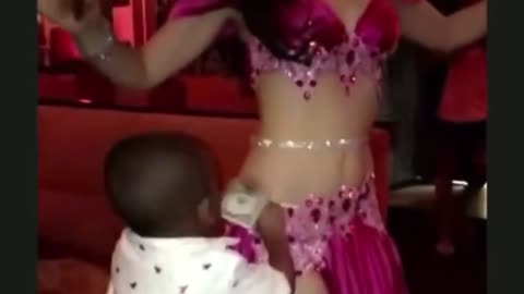 Kid Gives Belly Dancer a Gift