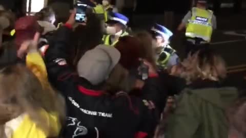 New Zealand Haka men PUSH POLICE to allow new cars into the "Protected" area