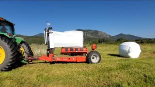 Day on the ranch wrapping grass hay for storage fall 2022 with a KUHN bale wrapper