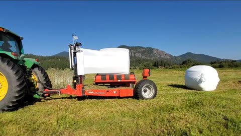 Day on the ranch wrapping grass hay for storage fall 2022 with a KUHN bale wrapper
