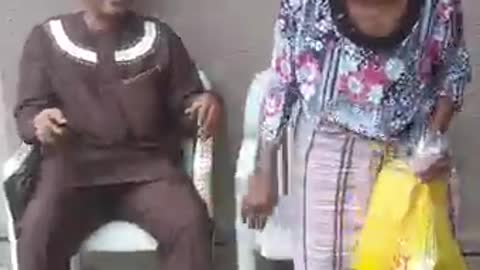 African old Mother exhibiting joyful moves when her son returned home