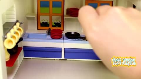 Decorating the Shelves in the Kitchen with Cups and Plates