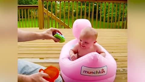 funny baby playing