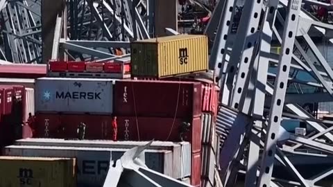 Workers Have Started Removing Shipping Containers From The Cargo Vessel That Is Pinned Under The Remains Of Baltimore Bridge