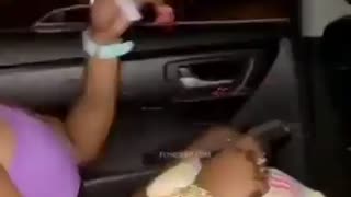 Black woman points a gun at the White Uber driver’s back.