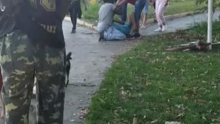 Drunks fighting in the street