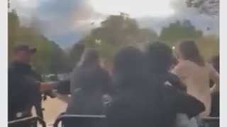 Protesters attempt to move and climb barriers around the white house..