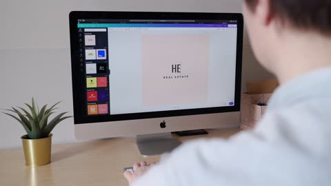 Man Working On A Web Design On A MAC