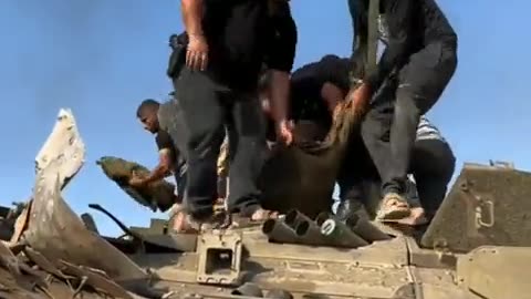 *An Israeli soldier is captured from his tank*