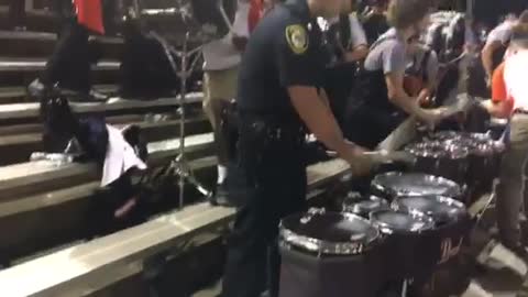 High School drumline gets huge surprise when cop shows up to play