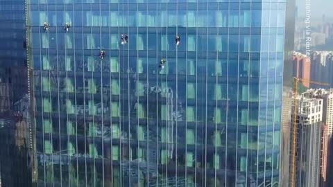 Window Washers Work on a 92-Floor Skyscraper