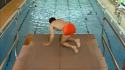 Mr Bean goes swimming and tries to attempt the diving board